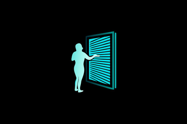 Person using a red light therapy panel in a wellness studio