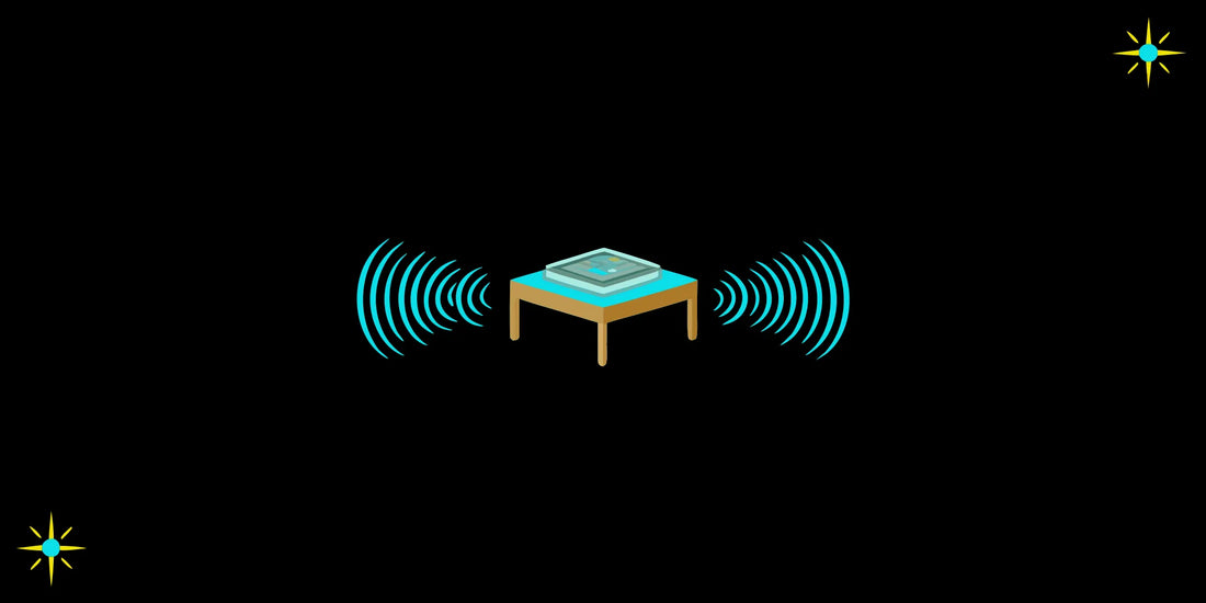 EMF protection device on a desk with electromagnetic wave visualization abstract