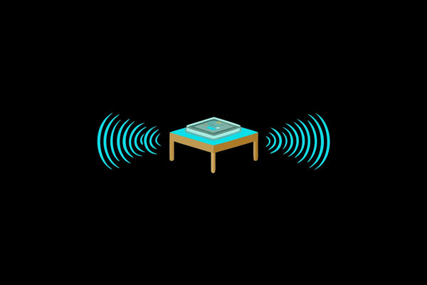 EMF protection device on a desk with electromagnetic wave visualization abstract