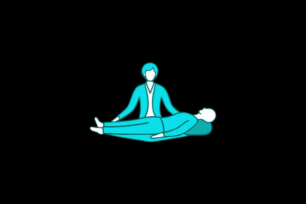 A practitioner guides a person through somatic healing practices for stress and trauma release.